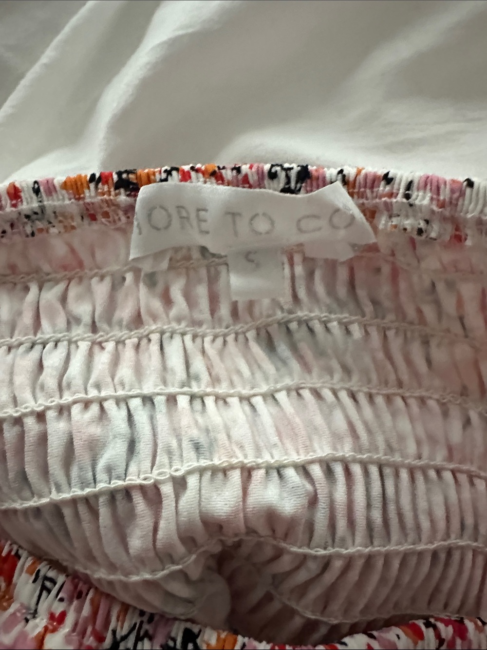 Smocked Floral Ruffle Mini Skirt in Pink - Picture 2 of 3